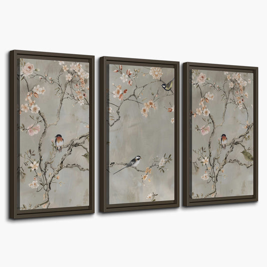 Small songbirds among pink and cream blossoms, green leaves and delicate branches on gray 3 piece framed canvas wall art on a white background