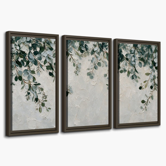 Soft green eucalyptus branches on a cream background 3 piece framed canvas wall art on a white background