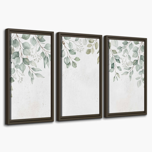 Pale sage eucalyptus leaves against a light background 3 piece framed canvas wall art on a white background