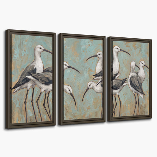 Long-legged white and gray wading birds against a muted aqua background 3 piece framed canvas wall art on a white background
