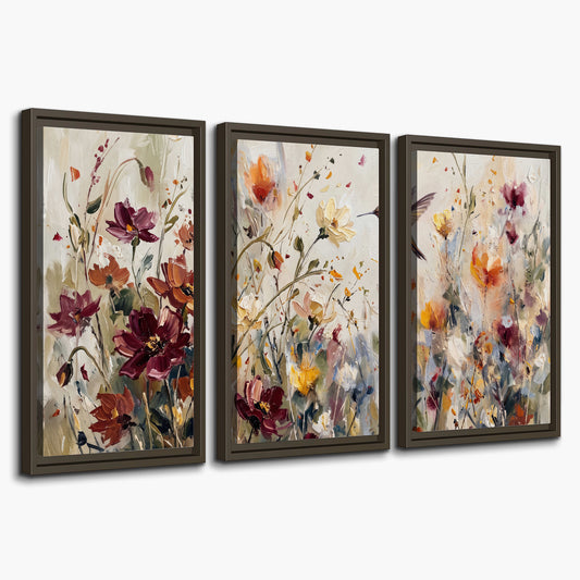 A small hummingbird among delicate pink, rust and ivory flowers 3 piece framed canvas wall art on a white background