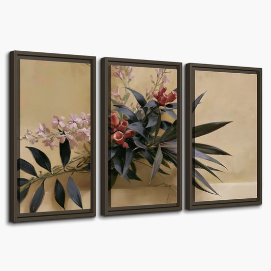 Long dark leaves and dusty pink flowers arranged against a soft beige background 3 piece framed canvas wall art on a white background