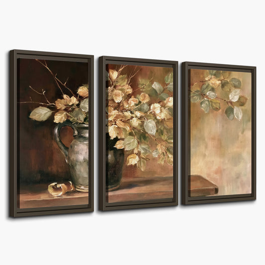Pale golden blossoms and leaves in a dark green vase on a wooden ledge 3 piece framed canvas wall art on a white background