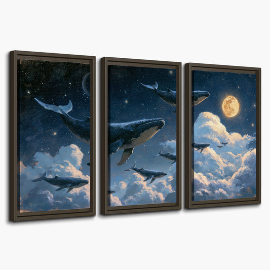 A group of whales floating among clouds beneath a golden moon in a deep blue night sky 3 piece framed canvas wall art on a white background
