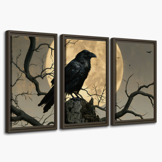 A black raven standing among bare branches in front of a large golden moon 3 piece framed canvas wall art on a white background