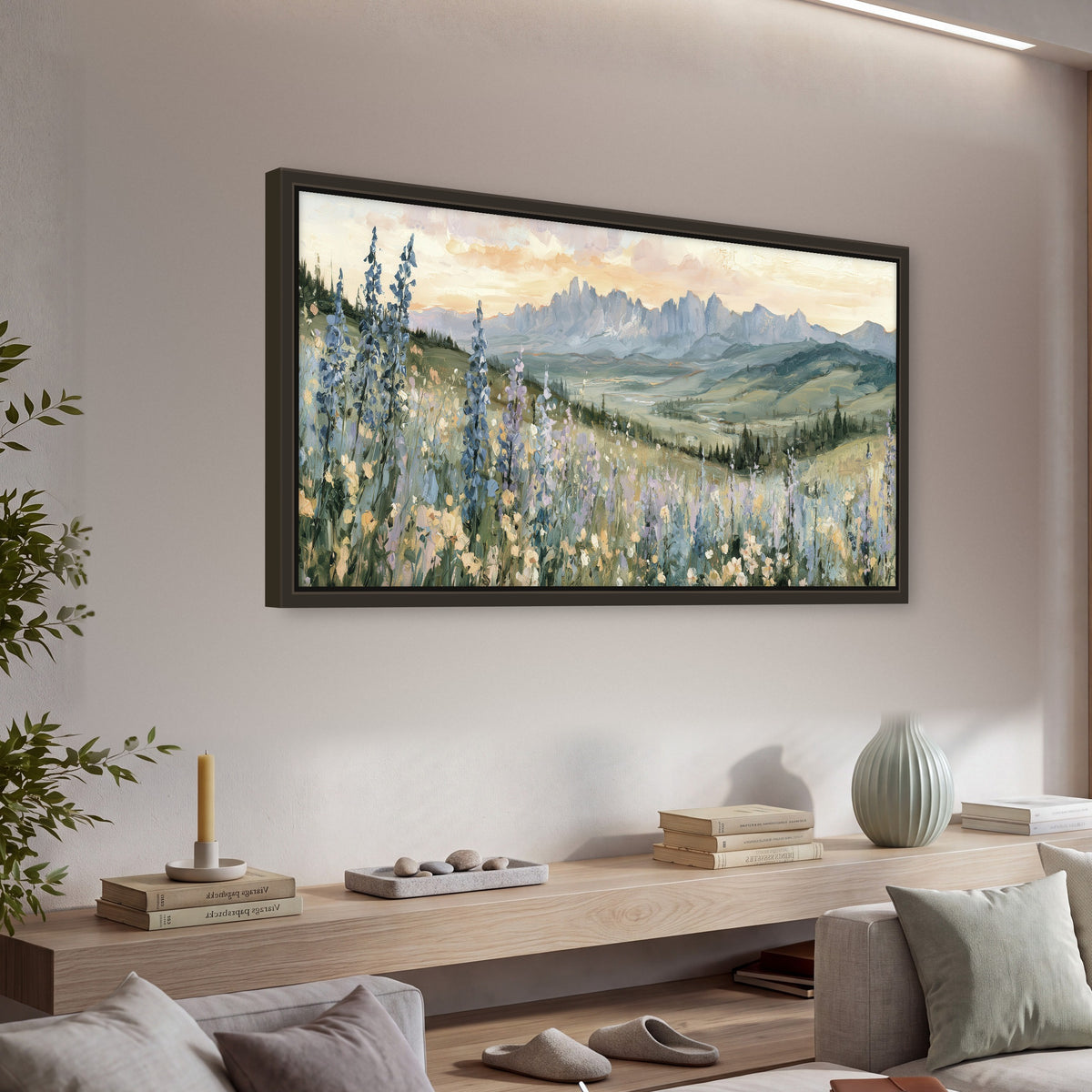 Mountain wildflower valley painting framed canvas wall art in a living room above a console