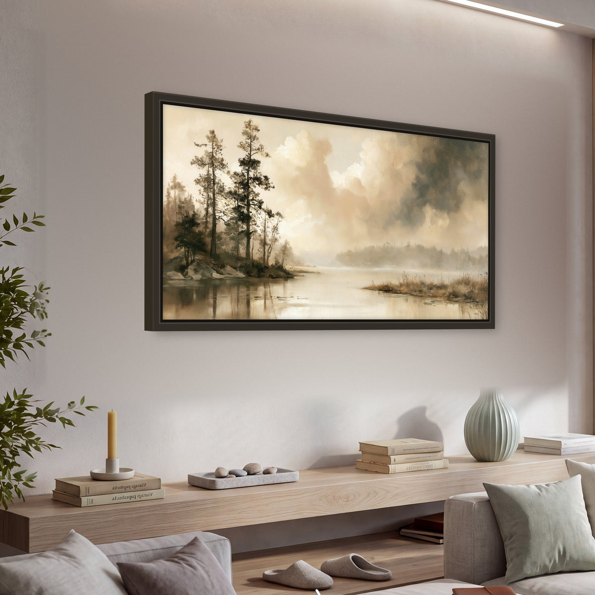 Vintage sepia pine lake painting framed canvas wall art in a living room above a console