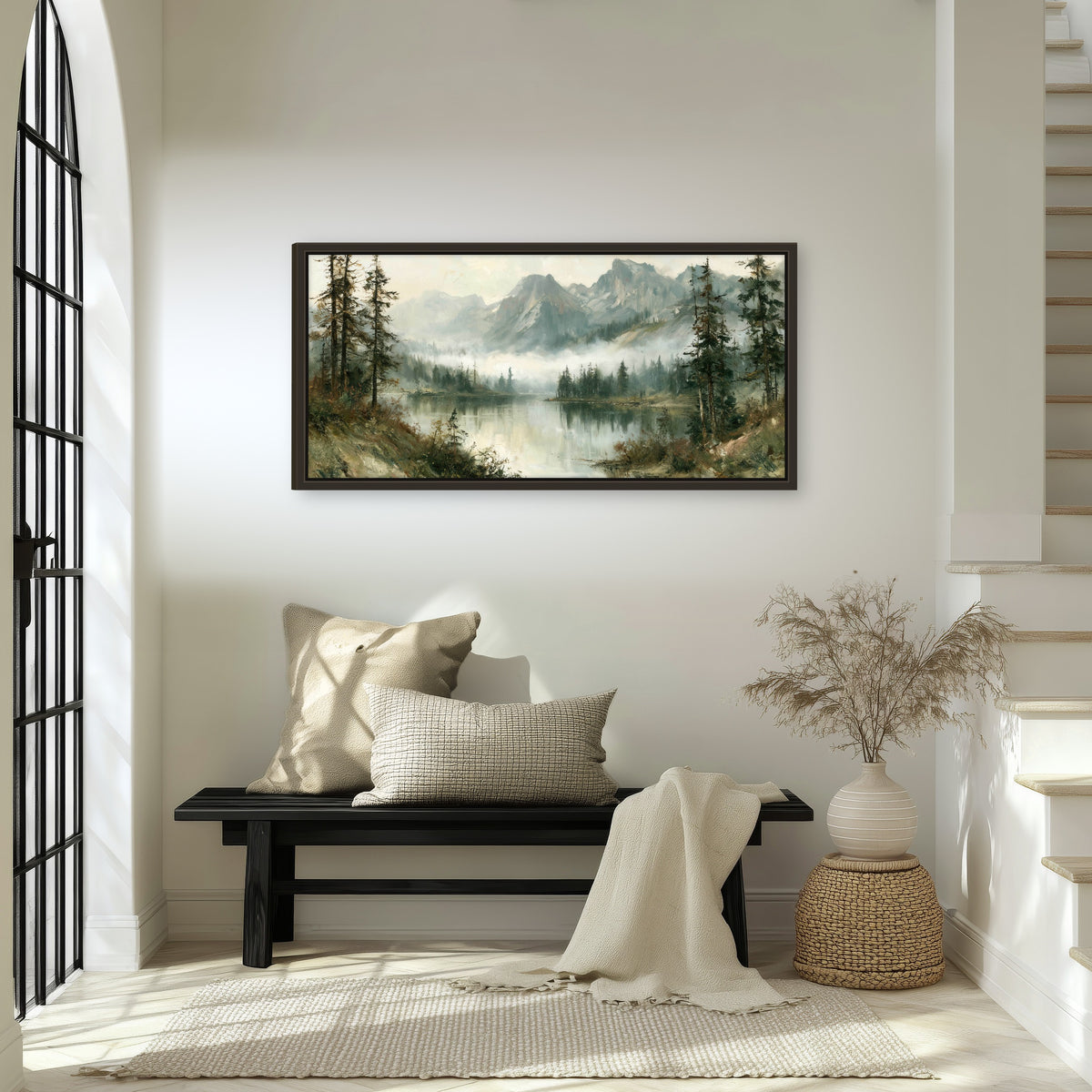 Misty alpine lake painting framed canvas wall art in an entryway above a bench
