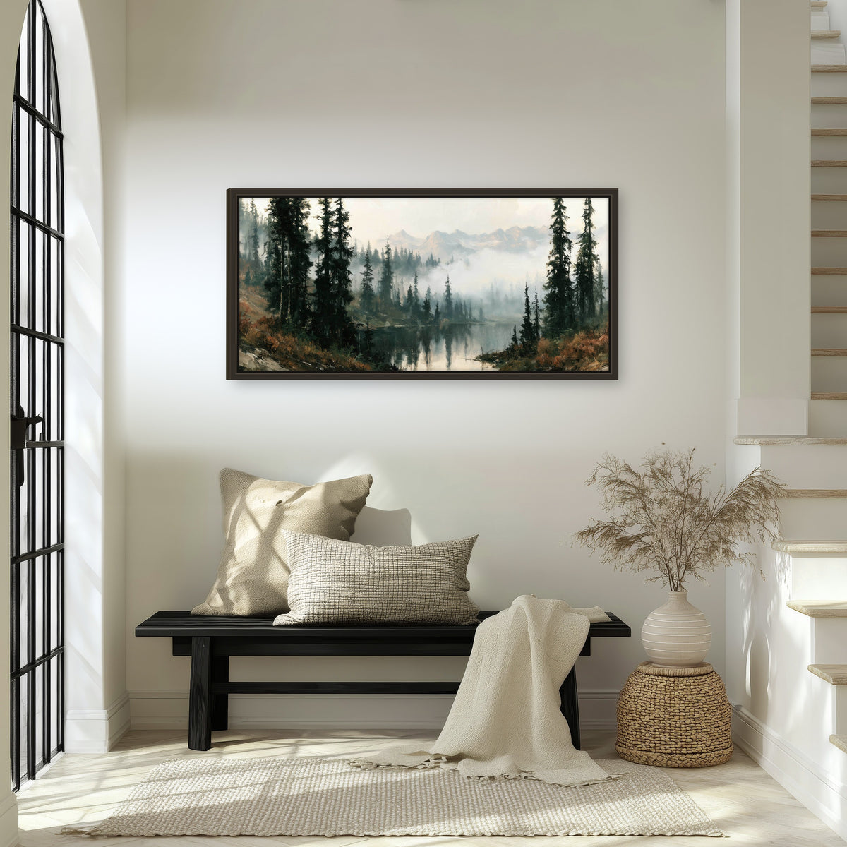 Misty pine lake mountain painting framed canvas wall art in an entryway above a bench