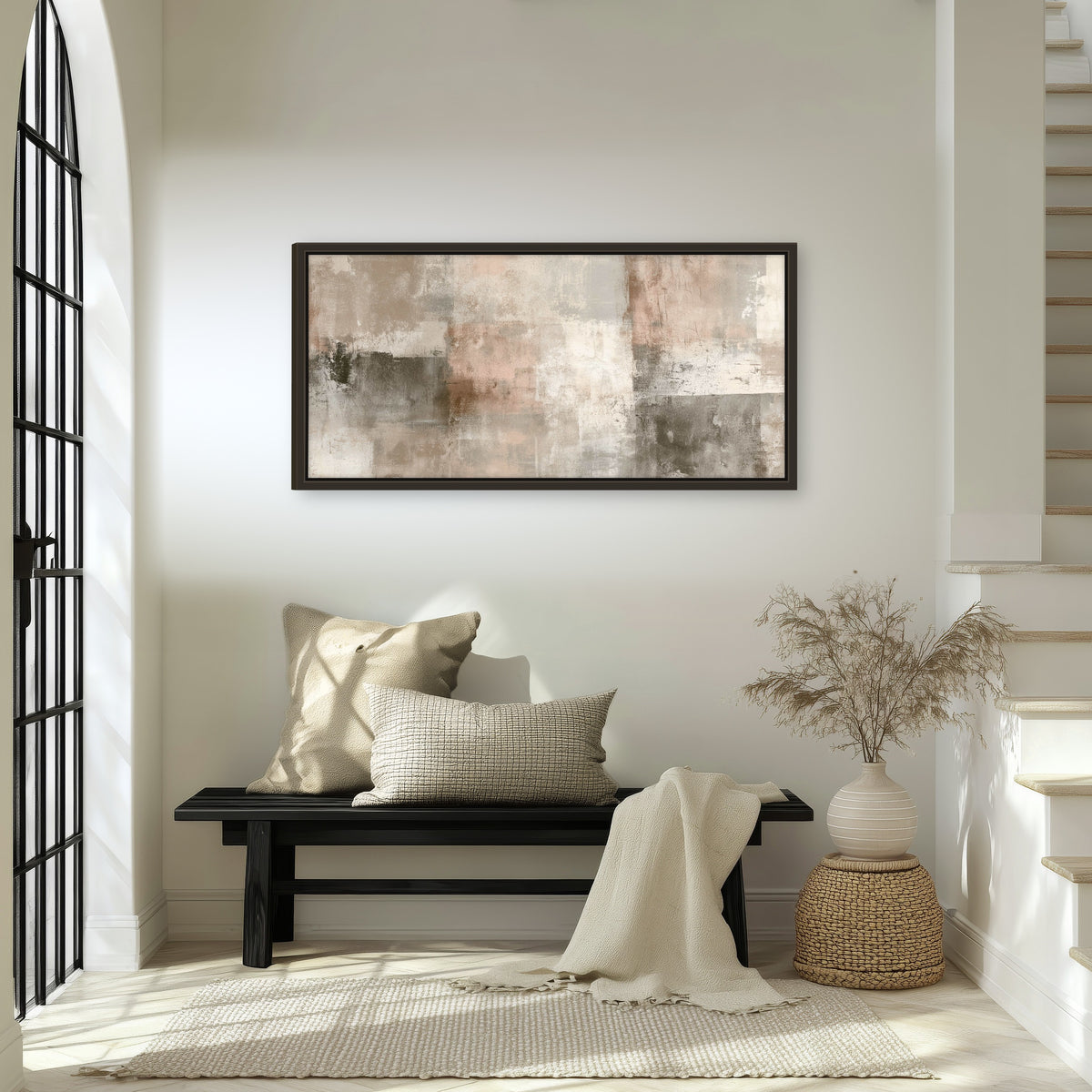 Blush and taupe abstract painting framed canvas wall art in an entryway above a bench