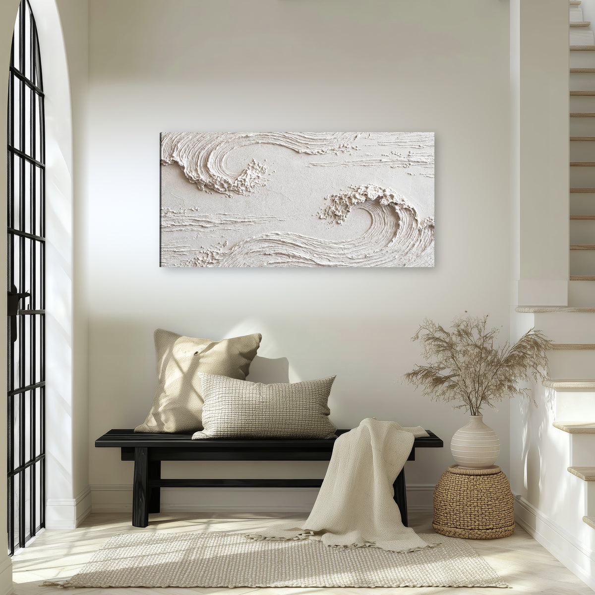 White plaster wave art canvas wall art in an entryway above a bench