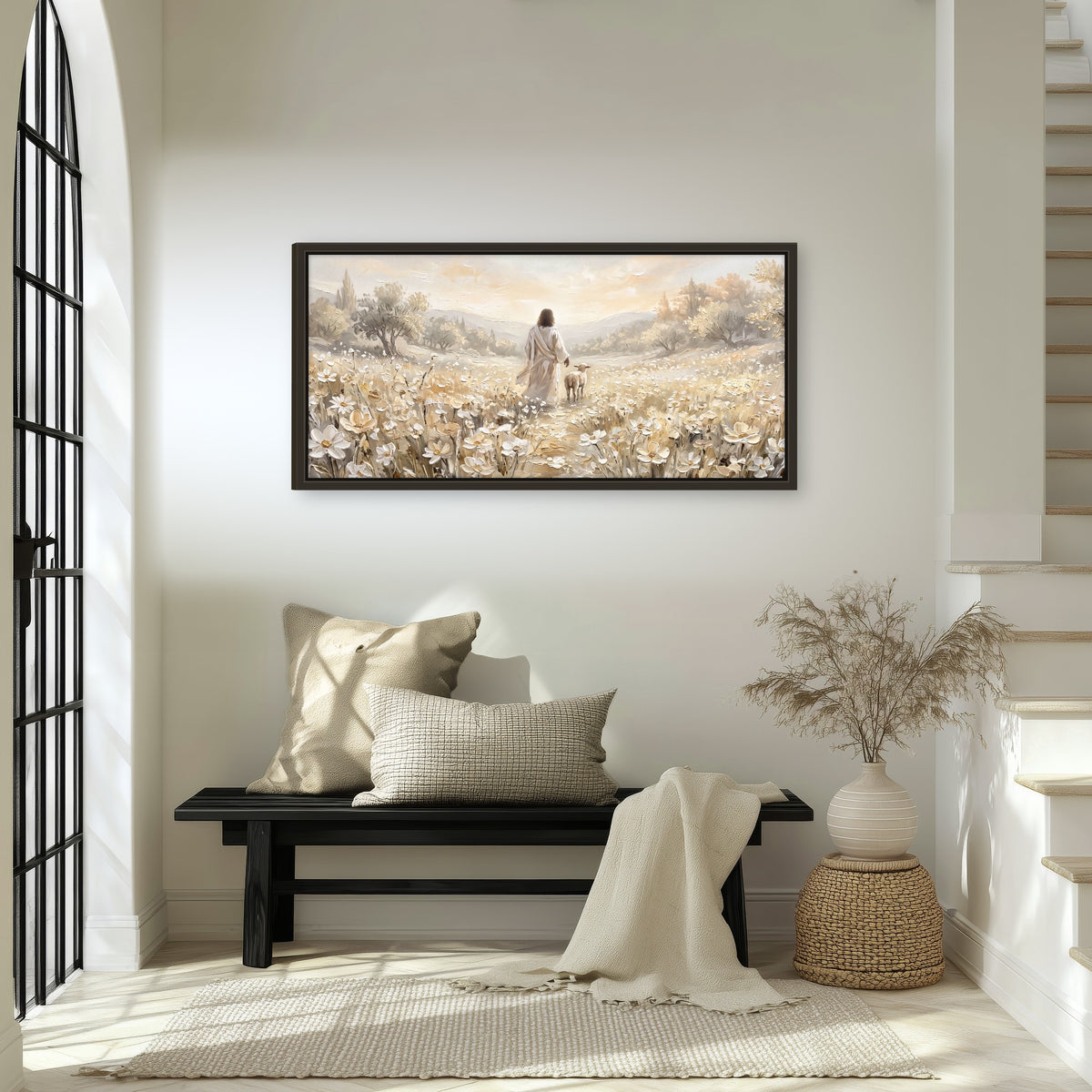 Jesus and lamb flower field painting framed canvas wall art in an entryway above a bench
