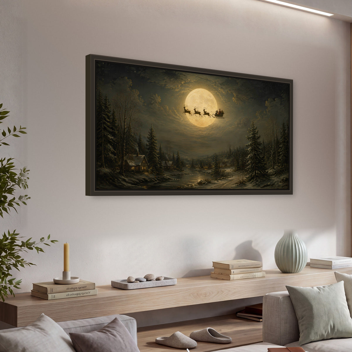 Santa sleigh full moon painting framed canvas wall art in a living room above a console