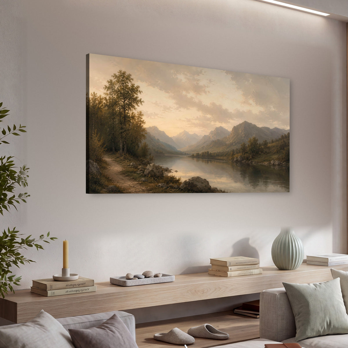 Golden mountain lake painting canvas wall art in a living room above a console