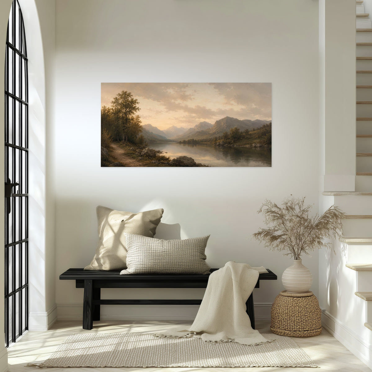 Golden mountain lake painting poster print in an entryway above a bench