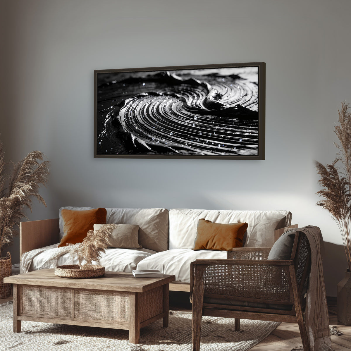 Black and silver swirl abstract painting framed canvas wall art in a rustic living room