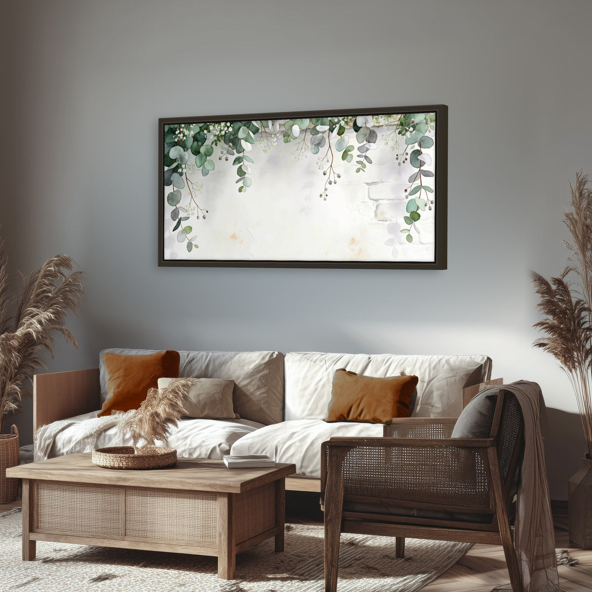 Watercolor eucalyptus greenery painting framed canvas wall art in a rustic living room