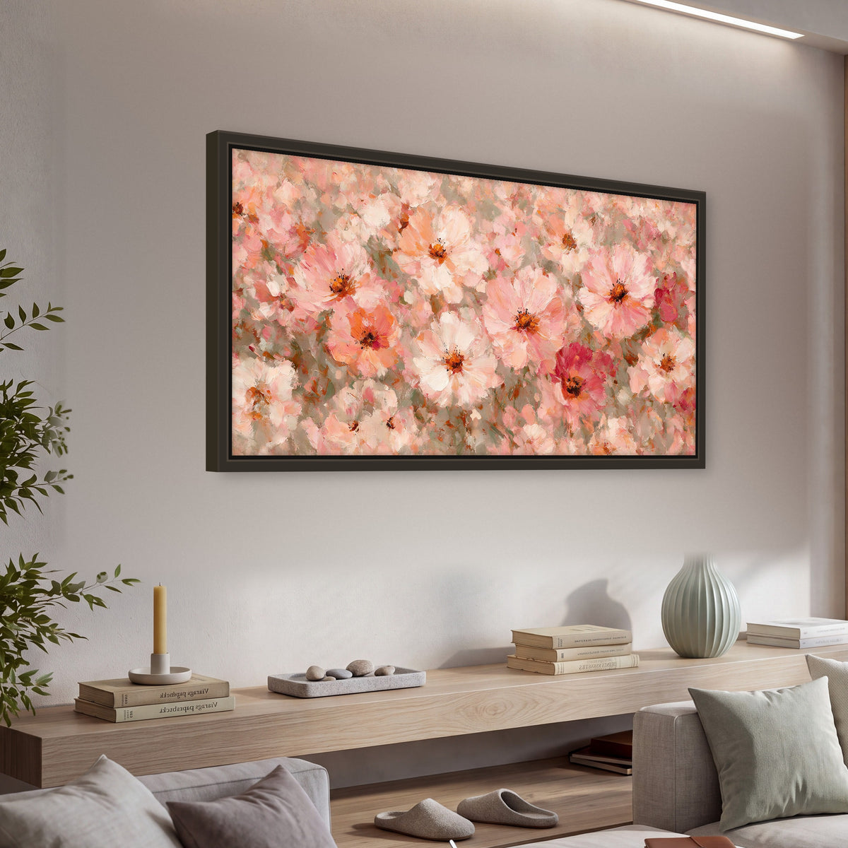Blush pink flowers painting framed canvas wall art in a living room above a console