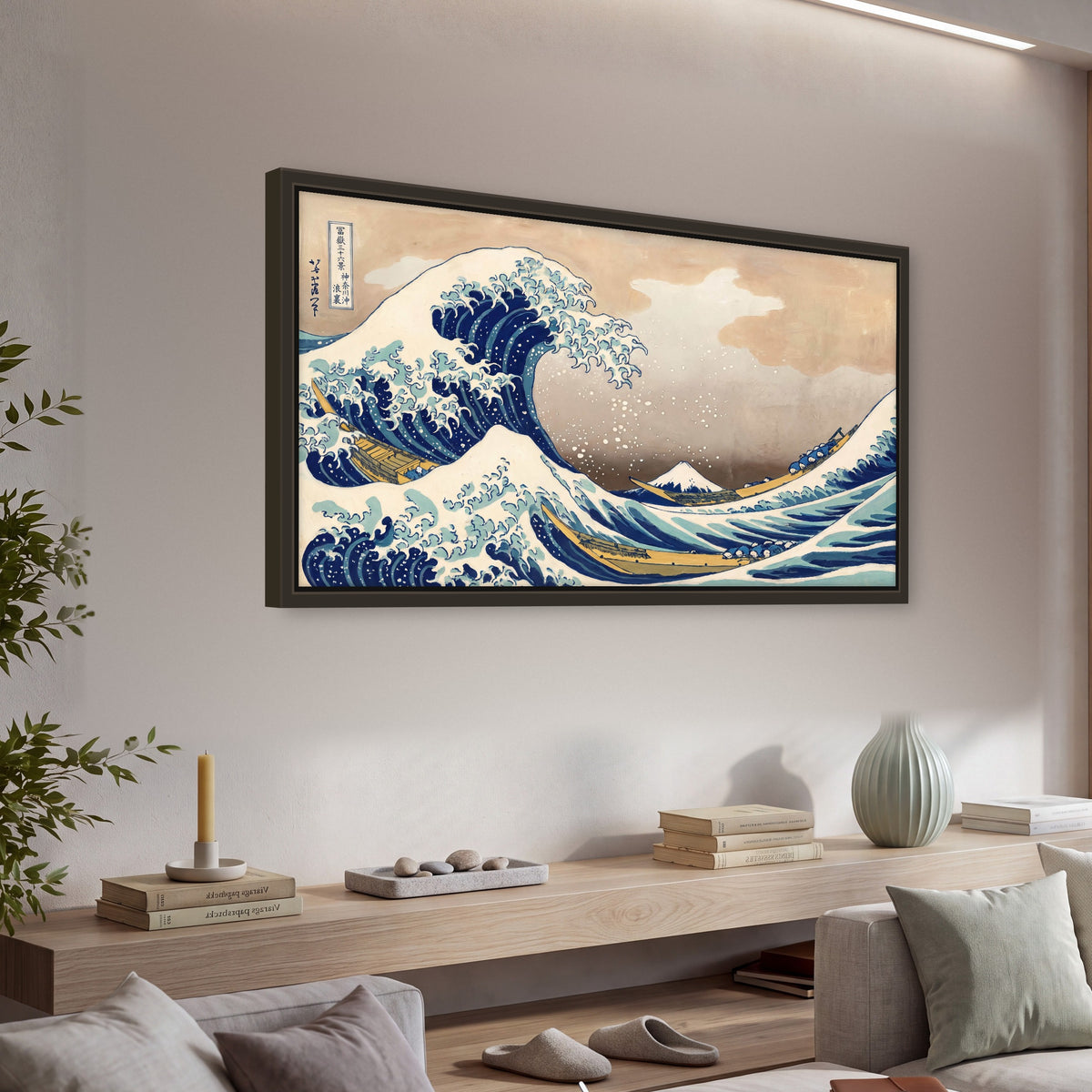 The Great Wave Japanese style painting framed canvas wall art in a living room above a console