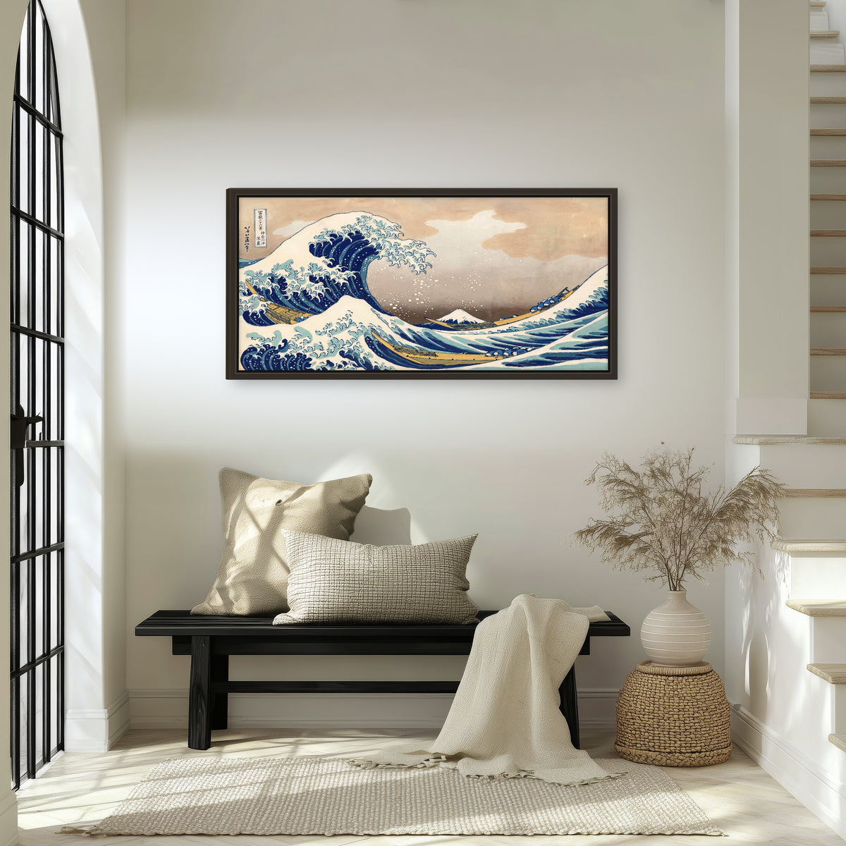 The Great Wave Japanese style painting framed canvas wall art in an entryway above a bench