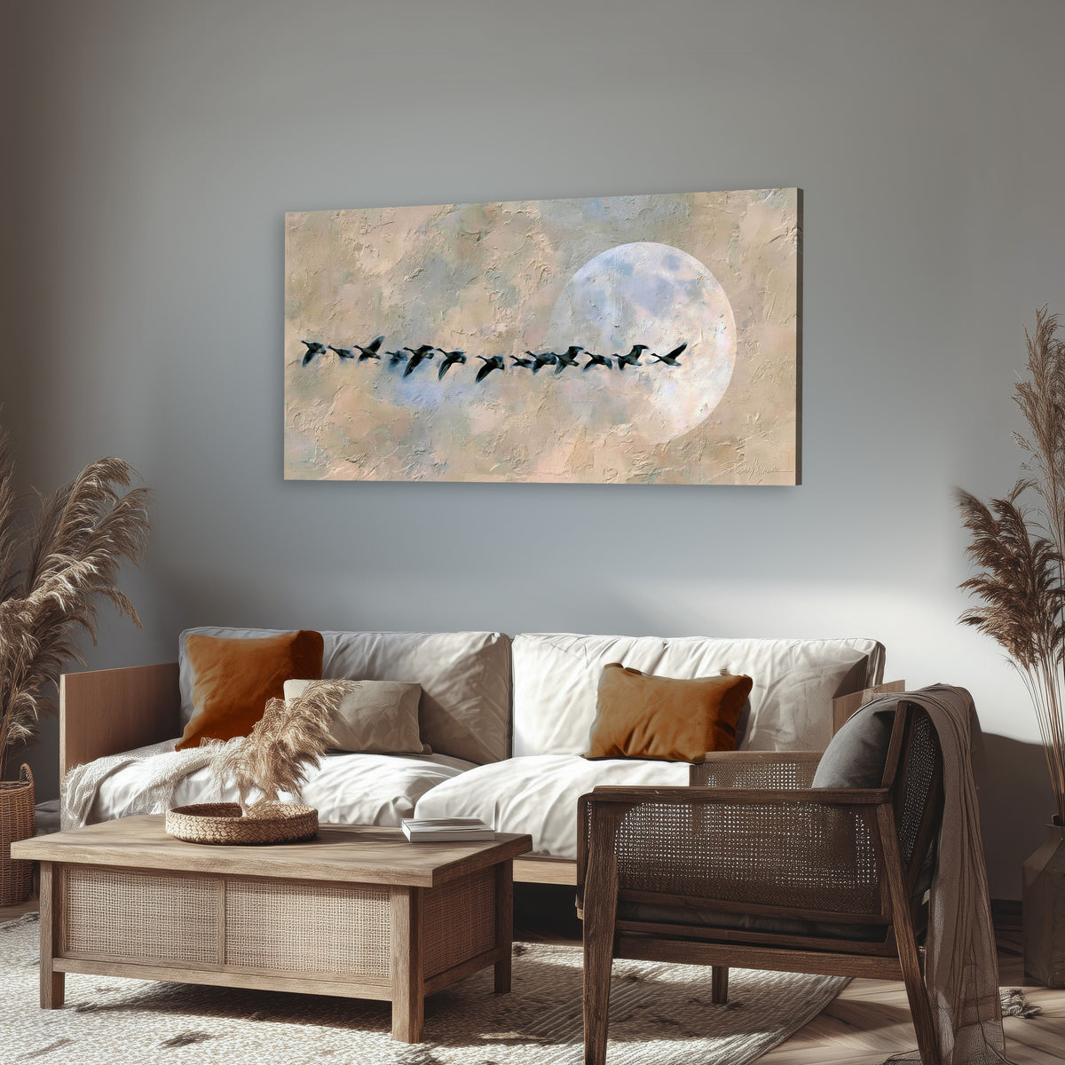 Geese flying across the moon painting canvas wall art in a rustic living room