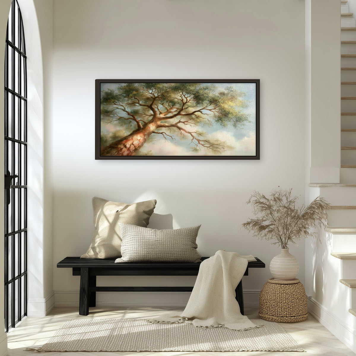 Majestic tree canopy painting framed canvas wall art in an entryway above a bench