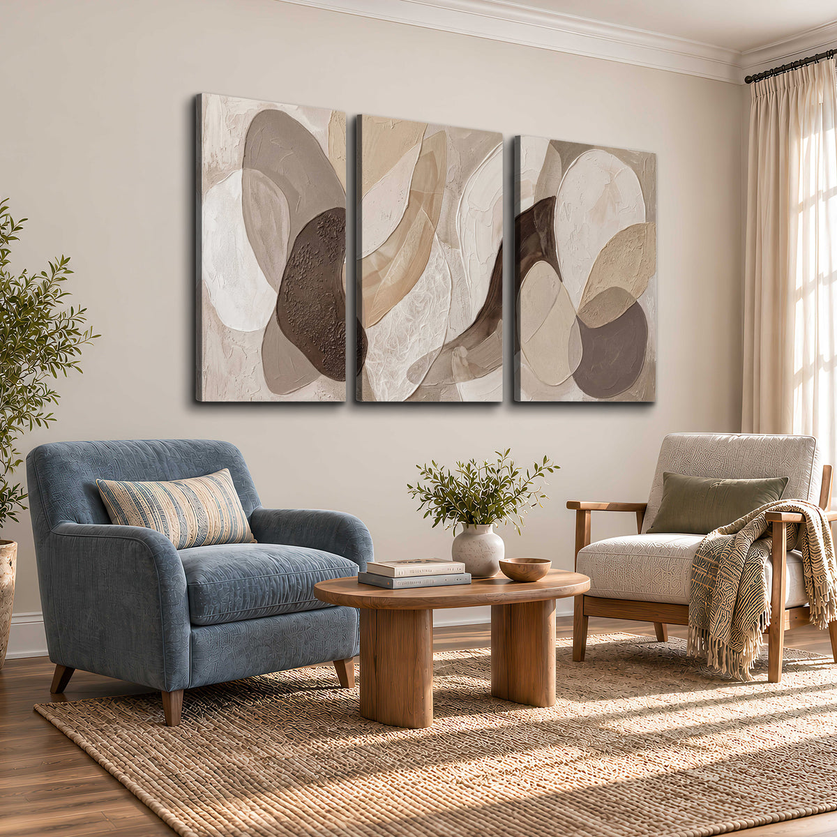 Layered organic shapes in taupe, cream and brown 3 piece canvas wall art styled in an interior