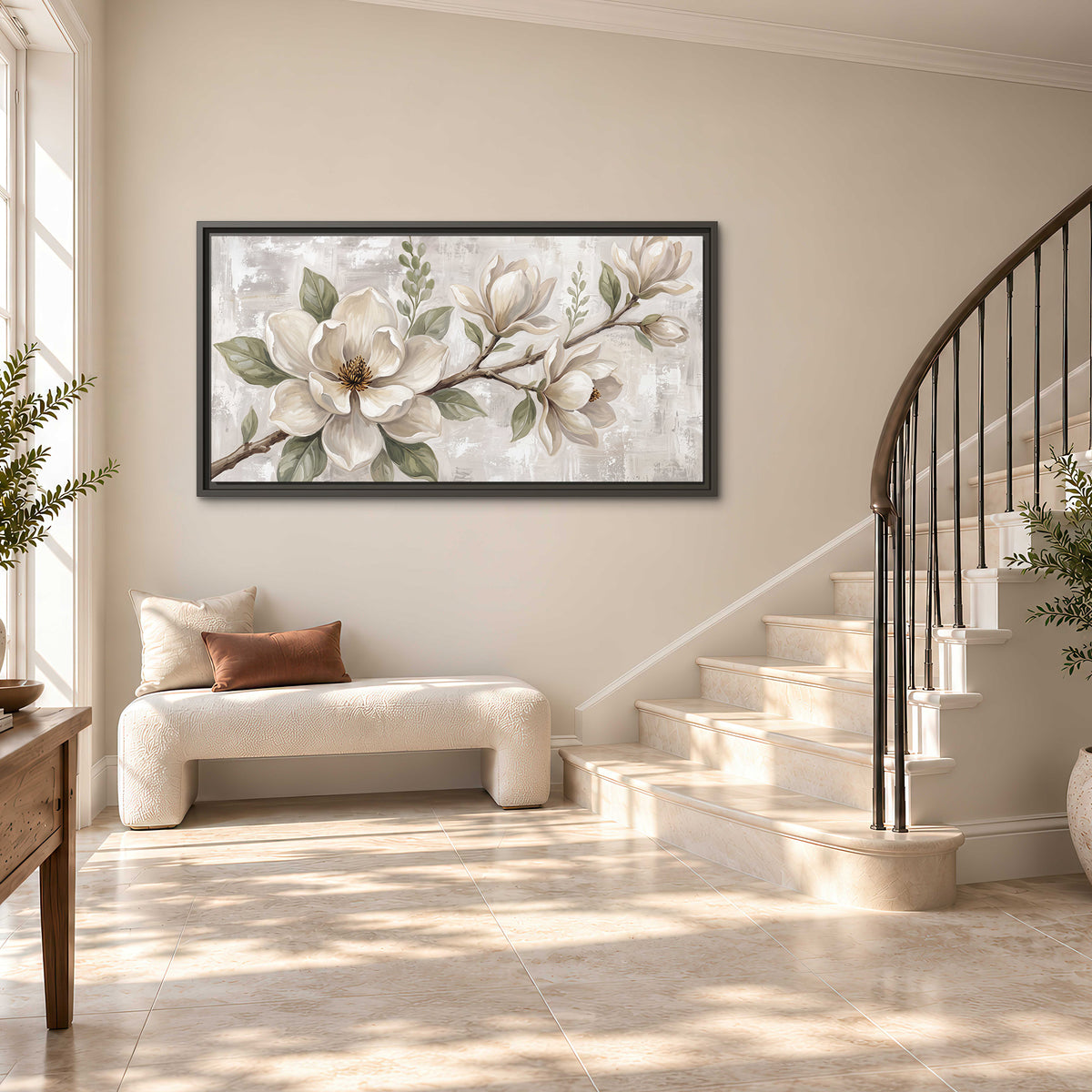 Large ivory magnolia blossoms and soft green leaves on pale gray single framed canvas wall art styled in an interior