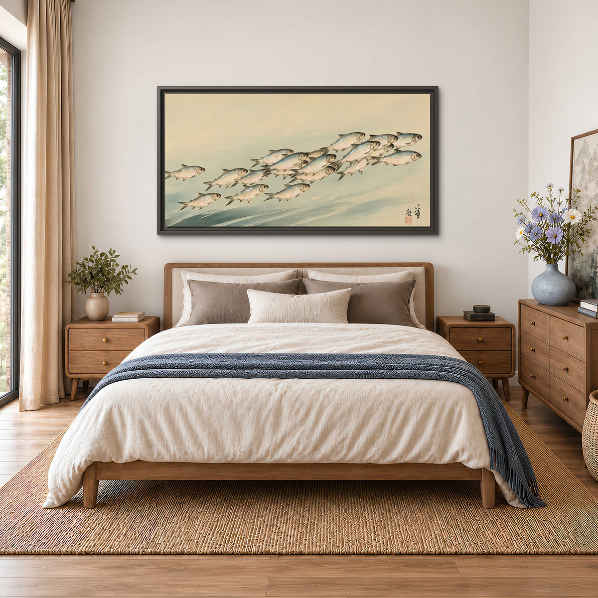 A flowing school of small fish above pale blue water on a cream ground single framed canvas wall art styled in an interior