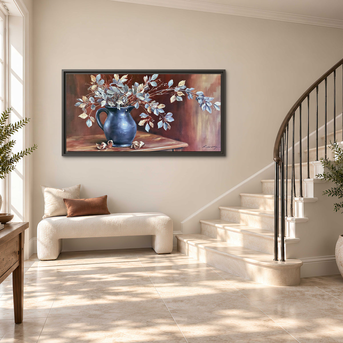 White flowering branches gathered in a deep blue pitcher against a warm rust-colored wall single framed canvas wall art styled in an interior