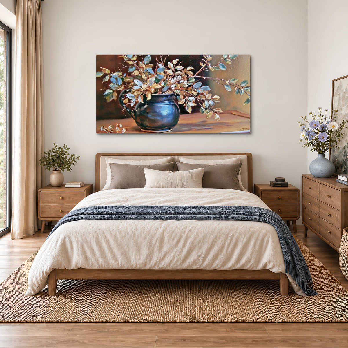 White and peach flowering branches arranged in a blue vase against a warm ochre background single canvas wall art styled in an interior