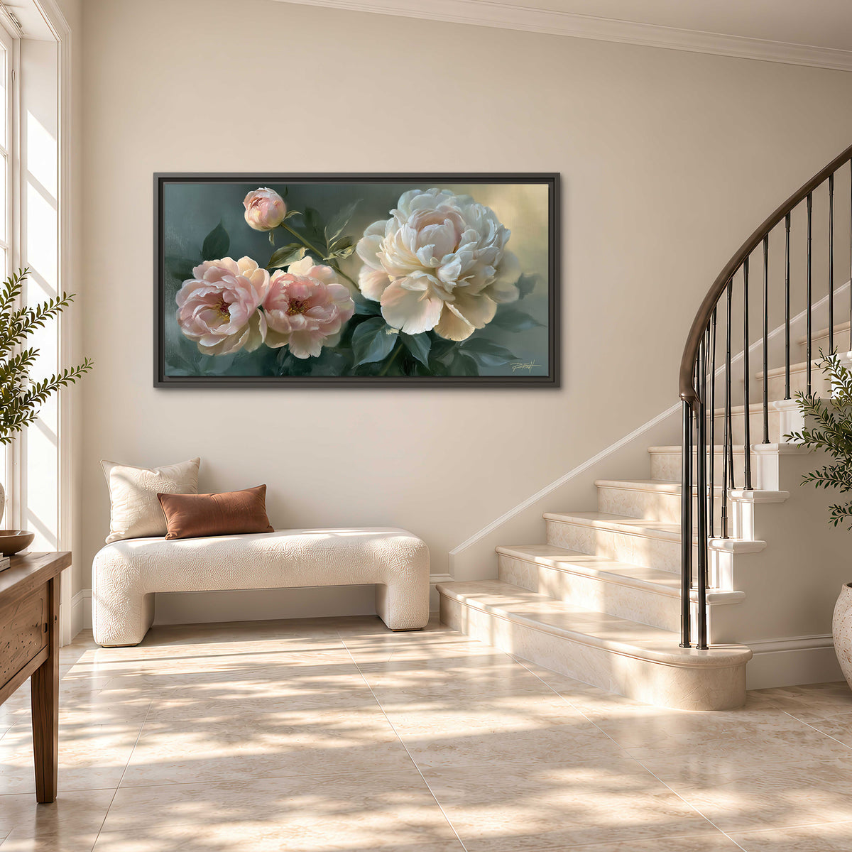 A large cream peony beside blush flowers and broad green leaves single framed canvas wall art styled in an interior