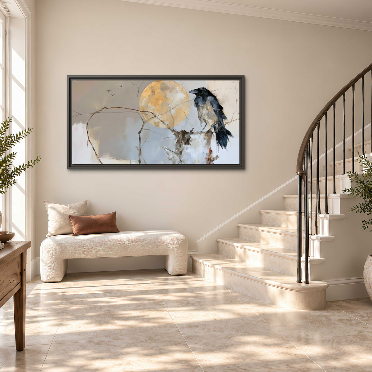 A dark raven beside a golden moon amid pale blue and cream painterly strokes single framed canvas wall art styled in an interior