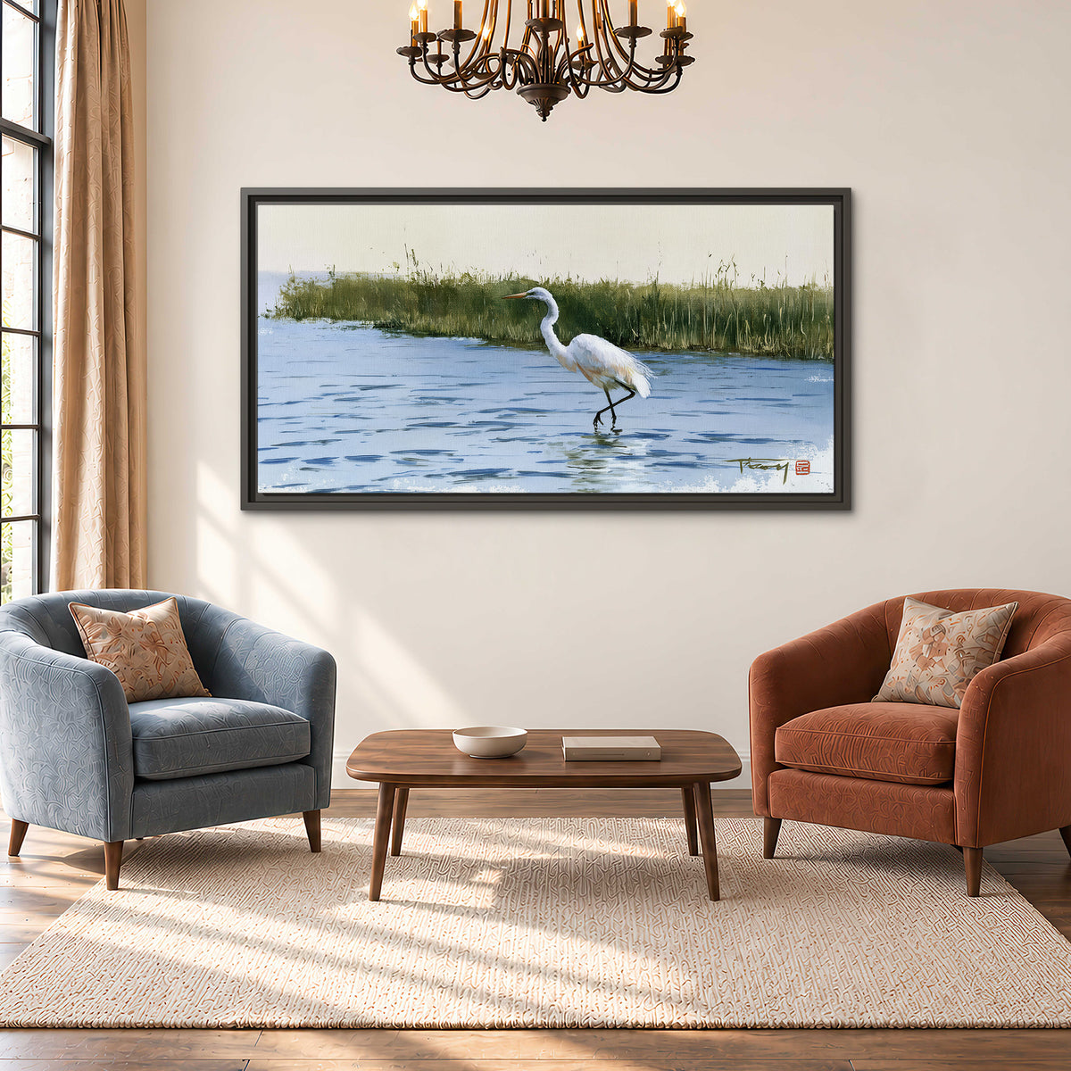 A white heron wading through bright blue water beside green reeds single framed canvas wall art styled in an interior