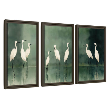 White egrets on green lake painting 3 piece framed canvas wall art set on a white background