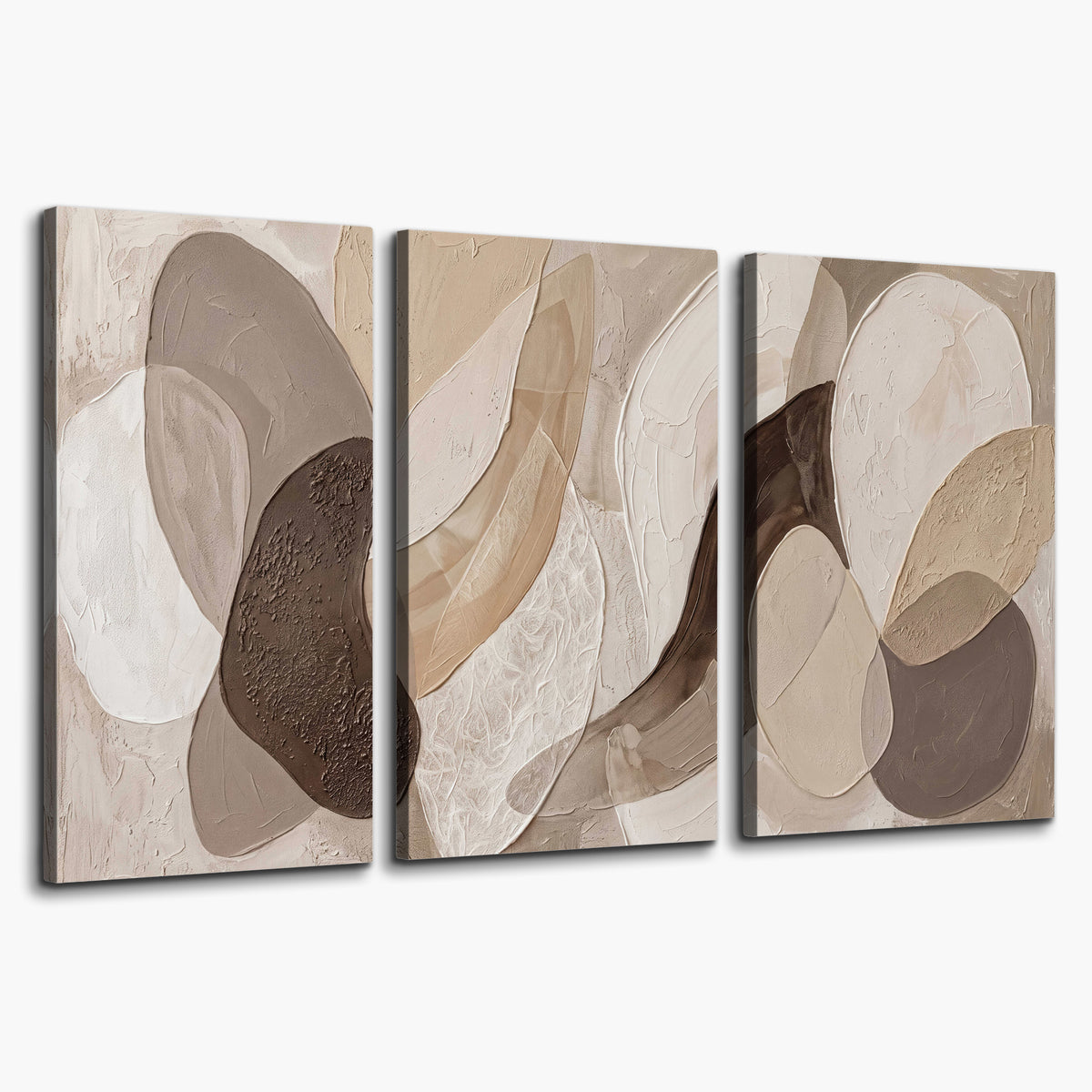 Layered organic shapes in taupe, cream and brown 3 piece canvas wall art on a white background