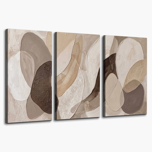 Layered organic shapes in taupe, cream and brown 3 piece canvas wall art on a white background