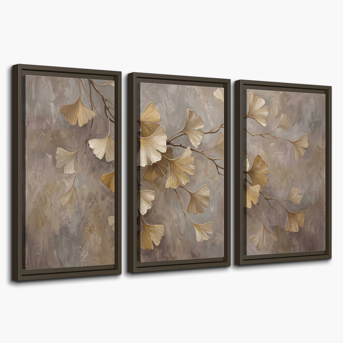 Cream and gold-colored ginkgo leaves against warm gray 3 piece framed canvas wall art on a white background
