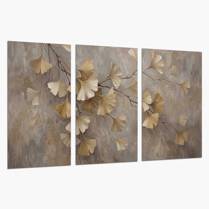 Cream and gold-colored ginkgo leaves against warm gray set of 3 poster prints on a white background