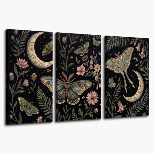 Decorative moths, crescent moons and flowers on black 3 piece canvas wall art on a white background