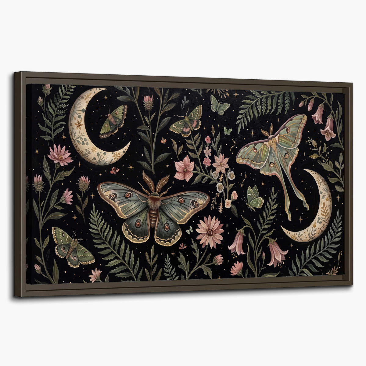 Decorative moths, crescent moons and flowers on black single framed canvas wall art on a white background