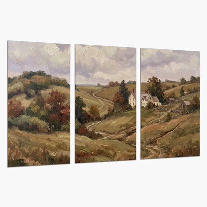 Warm rolling fields and countryside cottages beneath soft clouds set of 3 poster prints on a white background