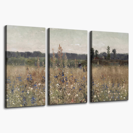 A loose painterly meadow with scattered blue and white wildflowers 3 piece canvas wall art on a white background
