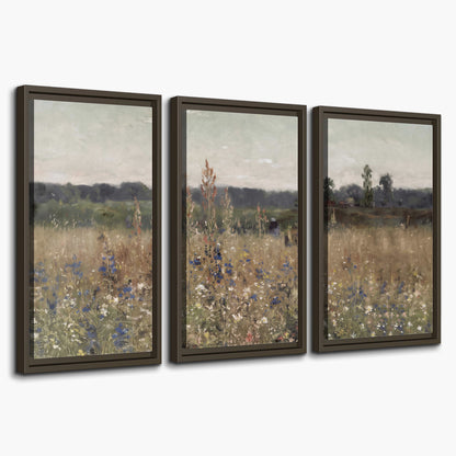 A loose painterly meadow with scattered blue and white wildflowers 3 piece framed canvas wall art on a white background