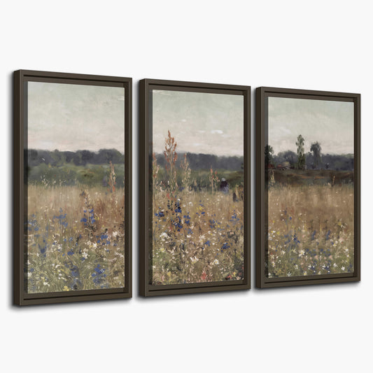 A loose painterly meadow with scattered blue and white wildflowers 3 piece framed canvas wall art on a white background