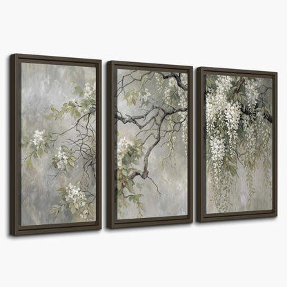 Trailing white blossoms and delicate green branches on pale gray 3 piece framed canvas wall art on a white background