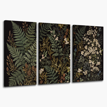 Layered green ferns and delicate cream flowers on a black background 3 piece canvas wall art on a white background