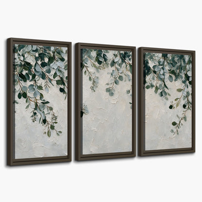 Soft green eucalyptus branches on a cream background 3 piece framed canvas wall art on a white background