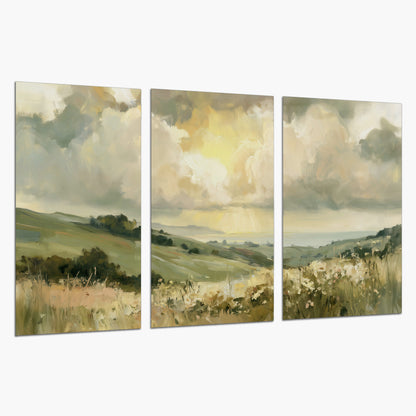 Rolling green hills beneath a luminous cloudy sky set of 3 poster prints on a white background