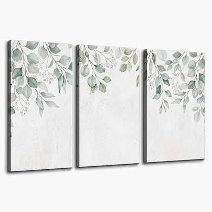 Pale sage eucalyptus leaves against a light background 3 piece canvas wall art on a white background